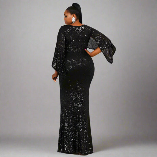 Back view of the Stacey Formal Gown, highlighting the mermaid silhouette and floor-length design.