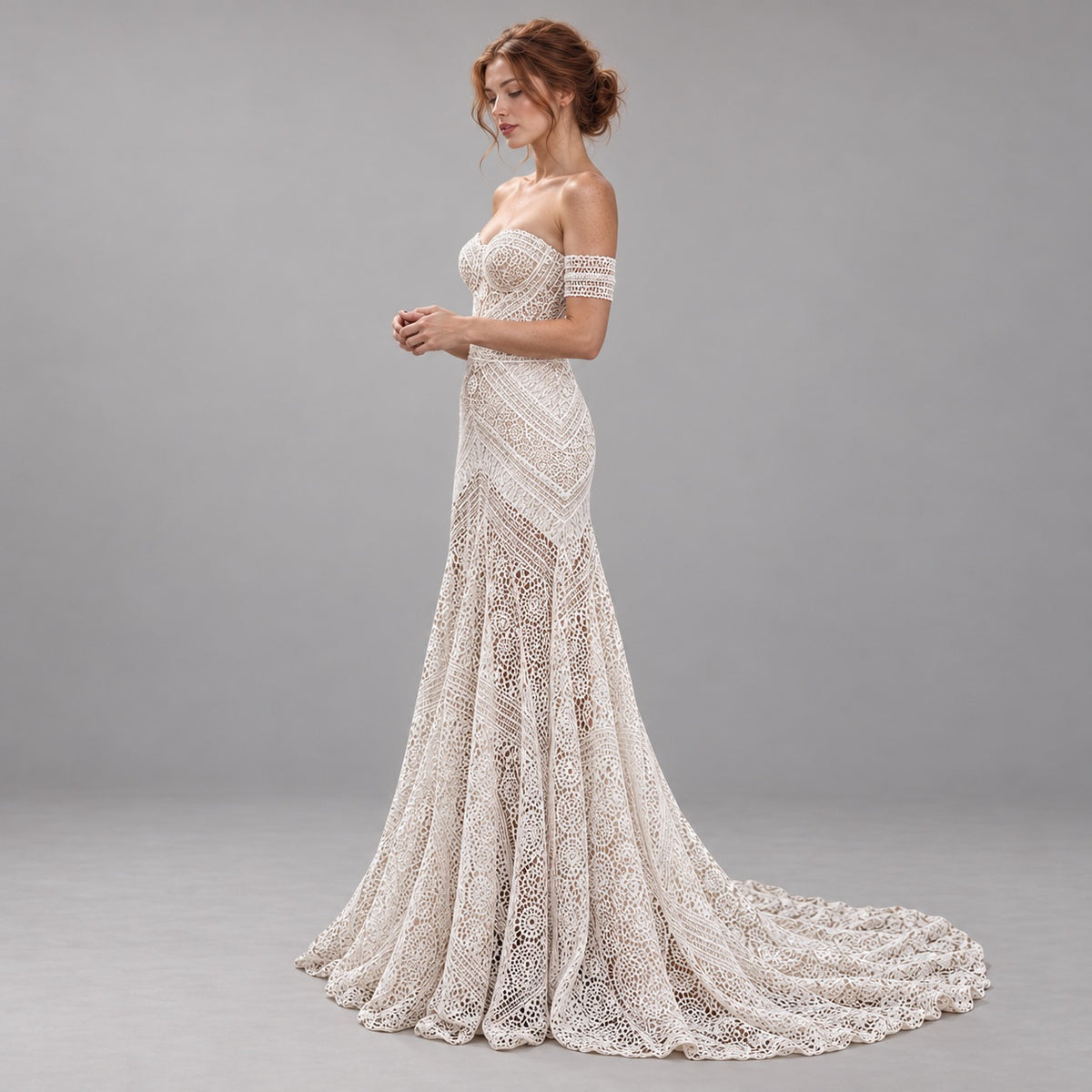 An off-the-shoulder lace wedding gown with a sweetheart neckline, fitted bodice, and dramatic train, shown on a model against a neutral gray studio background.