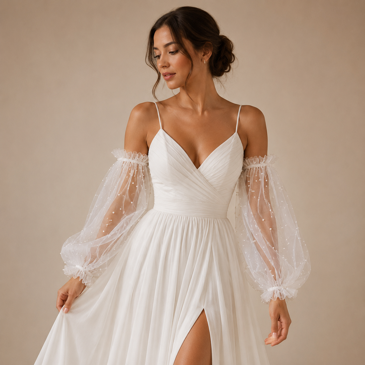 Bride wearing removable pearl puff tulle wedding sleeves with satin bridal dress