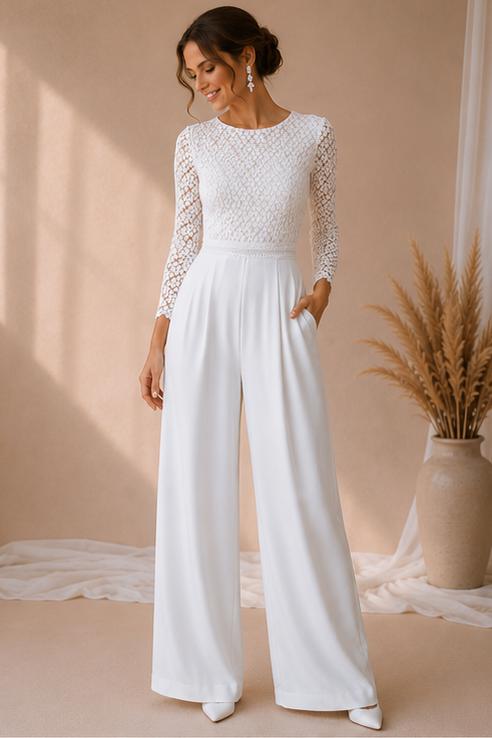 Woman wearing a white lace top and wide-leg pants against a beige background