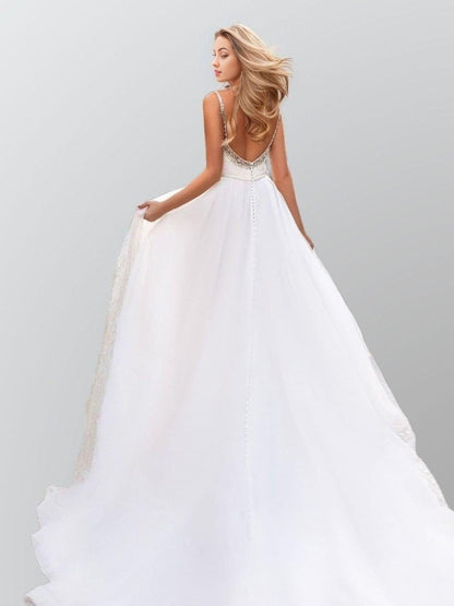 Beautiful women with flowing hair showcasing Backless RORY Wedding Gown