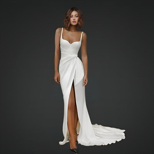 Woman in bridal gown with front split, and universally flattering ruched waist