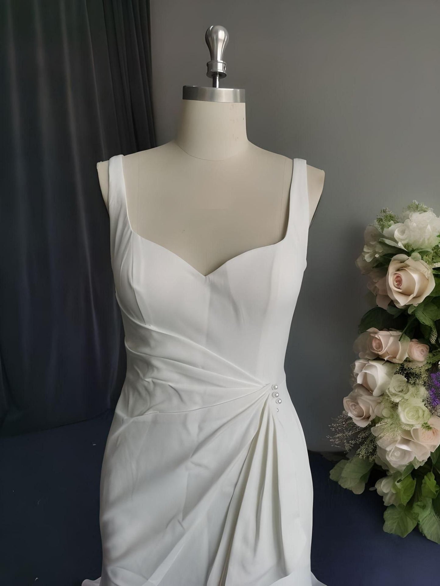 Detail  of weddding dress ruched waist which flatter every figure